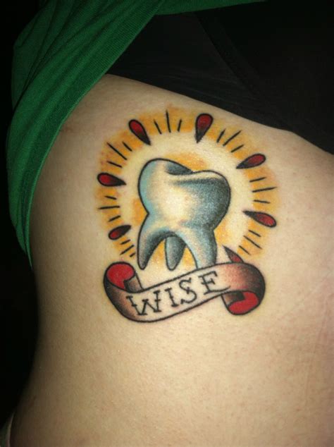 traditional tooth tattoo